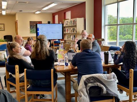 Cory trains a group of New Hampshire teachers